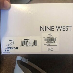 New pair of women’s size 8 tan Nine West heels